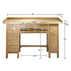 a wooden desk with drawers and measurements