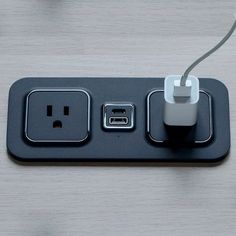 an electrical outlet with two plugs attached to it