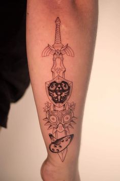 Zelda Midna Tattoo, Zelda Tattoo Ocarina Of Time, Legend Of Zelda Ocarina Of Time Tattoo, Zelda Matching Tattoos, Master Swordsman Zelda Tattoo, Hylian Shield Tattoo, Zelda Ocarina Of Time Tattoo, The Legend Of Zelda Tattoo Ideas, Midna Tattoo