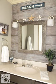 a bathroom sink with a mirror above it