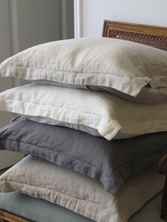 four pillows stacked on top of each other