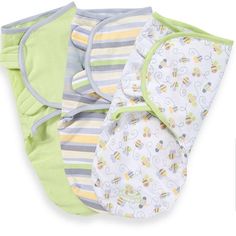 three baby diapers sitting next to each other