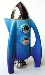 a blue coffee pot shaped like a rocket ship