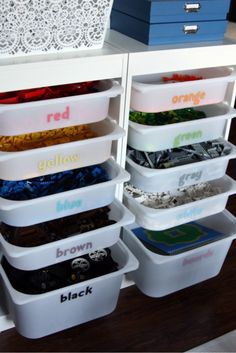 the drawers are organized with plastic containers