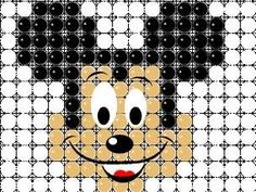 a mickey mouse face with black and white dots