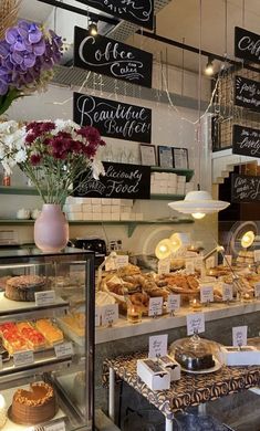 a bakery filled with lots of cakes and pastries