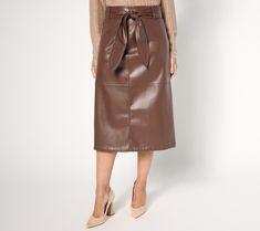 Explore an elegant new side to your style in this belted faux-leather midi, a striking, beautifully constructed selection for the office, celebrations, or date nights. From BEAUTIFUL by Lawrence Zarian. Chic Faux Leather Skirt With Lined Detail, Elegant Faux Leather Pleated Skirt, Faux Leather Midi Skirt With Lining, Luxury Faux Leather Women's Skirt, Luxury Black Faux Leather Skirt, Belt Skirt, Date Nights, Faux Leather Skirt, The Office