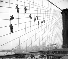 an image of people walking across a bridge with the caption photography by eugene de salgan / corresy nyc municipal archives archives archives