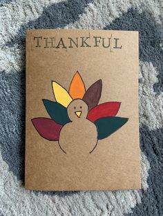 a card with a turkey on it that says, thank you and has the words