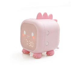 a pink alarm clock with a cat face on it's face and ears, sitting in front of a white background