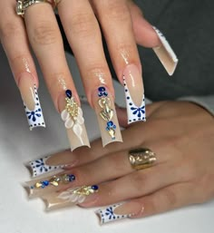 Nails|blue nails|white nails|gold charms|Gold|cream|white|blue Light Blue White And Gold Nails, White Gold And Blue Nails, Navy Blue Nails Designs Classy, Gold And Blue Nails Design, Blue White And Gold Nails, Nails Gold Charms, Royal Blue And Gold Nails, Gold And Blue Nails, Mexico Inspired Nails