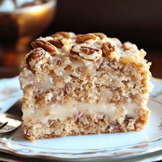 a piece of cake sitting on top of a white plate