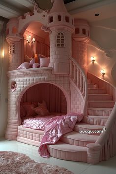 a pink princess castle bed with stairs to the top and sleeping quarters on the bottom