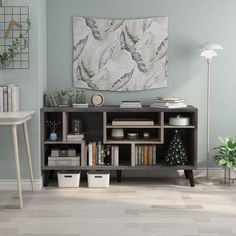 a living room with a book shelf and some plants