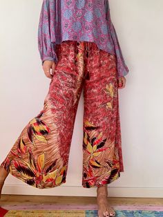 "This may be your new favorite pants , super soft and light trousers Made of bended silk Easy fits with elastic waist Perfect in the city for work or holiday escapades True boho hippie look MEASURE M Waist (stretchy) 30\"-36\" Hips 38\" Leg ( measure from waist ) 38\" MATERIAL  *silk  Thank you for looking" Chic Pants For Spring Festival, Summer Wide-leg Viscose Pants, Summer Viscose Wide-leg Pants, Summer Straight Rayon Pants, Hippie Harem Pants For Spring Loungewear, Spring Viscose Wide Leg Pants With Elastic Waistband, Wide Leg Silk Pants With Elastic Waistband, Silk Wide Leg Pants With Elastic Waistband, Flowy Viscose Bottoms For Day Out