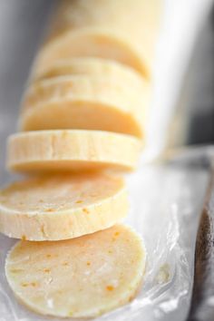 slices of banana sitting on top of plastic wrap