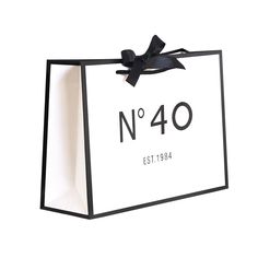 a black and white shopping bag with the number forty on it's front side