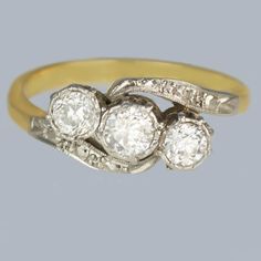 an antique three stone diamond ring