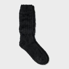 Keep your feet warm with the Women’s Cozy Slouch Crew Socks from Auden™ 4-10. These ultra plush, supremely soft socks are made from buttery soft yarns, ensure maximum comfort and warmth. Ribbed knit cuffs provide a secure fit that stays in place all day. The relaxed slouchy look is perfect for lounging at home or pairing with your favorite slippers or boots. Experience cozy, comfortable feet every day with these essential crew socks. Auden™: Fit for you in every way. Cozy Warm Socks With Cozy Fit, Cozy Warm Socks For Cold Weather, Cozy Snug Socks For Cold Weather, Cozy Fit Warm Socks, Cozy Warm Snug Socks, Cozy Black Socks For Cold Weather, Warm Cozy Comfortable Socks, Cozy Warm Solid Color Socks, Thick Comfortable Cozy Socks