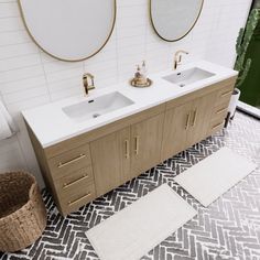 a bathroom with a sink, mirror and rug