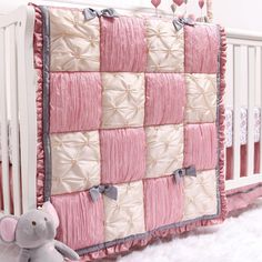 Our Bella 3 Piece Crib Bedding Set will create an enchanting nursery for your little girl. Opulent pink crinkled taffeta and cream tufted taffeta are arranged with accents of grey in an elegant patchwork design. The lovely floral print and bow details make this collection too charming to not fall in love with. The 3 piece crib bedding set includes the patchwork quilt (32"x41"), dust ruffle (52"x28"x12" drop) and microfiber fitted sheet (52"x28"x8" pocket). The sheet features a pink floral print. Pink Crib, Dust Ruffle, Crib Skirts, Nursery Essentials, Crib Blanket, Nursery Set, Crib Quilt