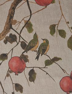 two birds are sitting on the branch of an apple tree with apples and leaves painted on it