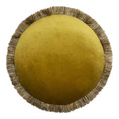 a round yellow cushion with fringed edges