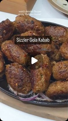 a plate full of fried food with the words sizzler gola kabab