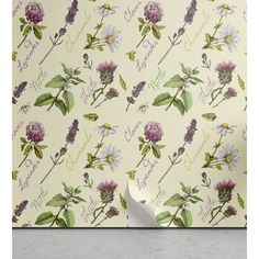 a wallpaper with purple flowers and green leaves