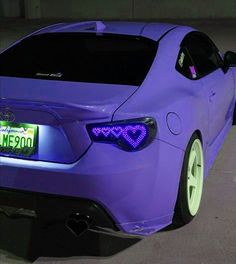 hue edit of an aesthetic car with heart back lights Image Moto, Purple Car, Cool Car Accessories, Pimped Out Cars, Car Things, Cute Car Accessories, Street Racing Cars