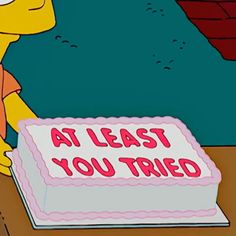 a cake with the words at least you tried on it