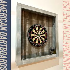 a dart board mounted to the side of a wall