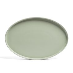 a green plate on a white background