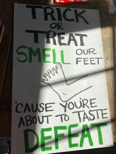 a sign that says trick or treat smell our feet cause you're about to taste defat