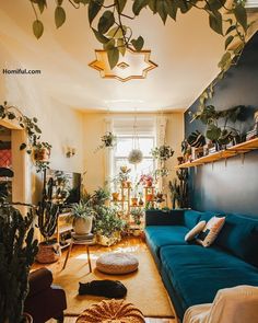 a living room filled with lots of plants