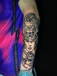 a person with a tattoo on their arm