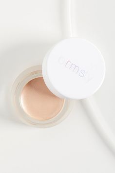 **RMS** Using the incredible light-reflecting technology behind RMS’ signature Living Luminizer, this naturally crafted highlighter is truly magic on skin- creating a moonlit-champagne shimmer. * Warm glow with incandescent neutrals and subtle pink undertones * 4.82 g * Intended for all skin types. * **Ways To Apply:** * over cheekbones and down the bridge of the nose * along inner corners of eyes and cupid's bow above lips * on center of eyelids, just above the lashes. | RMS Beauty Magic Lumini Metallic Birkenstocks, Cupid's Bow, Beauty Magic, Cupids Bow, Elf Cosmetics, Free People Store