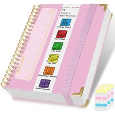 a pink binder with different colored labels on the front and back of each binder