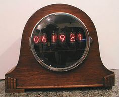 an old clock with the time displayed on it