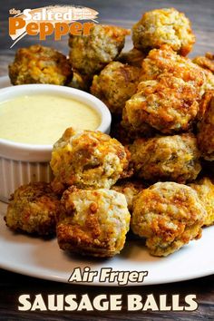 air fryer sausage balls on a plate with dipping sauce