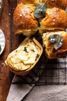 several rolls with cream cheese and herbs on them