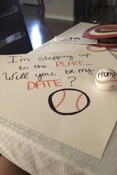 a baseball sits on top of a table next to a note that says, i'm stepping up while you wait for my date?