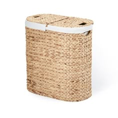 a woven basket with a white handle on the top and bottom, is shown in front of a white background