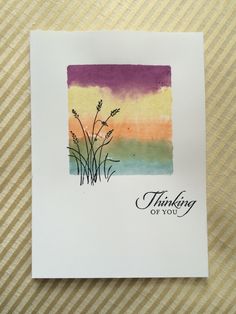 a card with the words thinking of you on it