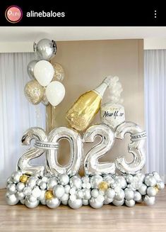 a new year decoration with champagne and balloons