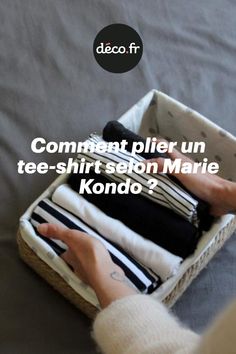 someone is packing their clothes in a basket on the bed with text that reads comment plier un tee - shirt seon marie kondo?