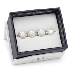 Classic and chic, our Silver and Mother of Pearl Studs grant an immediate ensemble boost to your formal wardrobe. Smooth, iridescent Mother of Pearl discs nestle inside silver-finished settings for a simple, classic look suitable for any event. The expert craftsmanship of our base metal studs ensures long-lasting durability. Pairs perfectly with our Silver and Mother of Pearl Cufflinks. Pearl Cufflinks, Engraved Cufflinks, Tuxedo Shirt, Knot Studs, Bar Gifts, Stud Set, The Expert, Simple Elegance, Pearl Studs