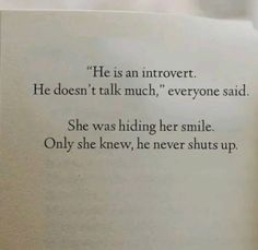 an open book with the words he is an introvert he doesn't talk much, everyone said she was hiding her smile only she knew, he never shut up