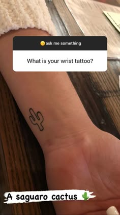 a person's wrist with a tattoo on it and the caption says, what is your wrist tattoo?