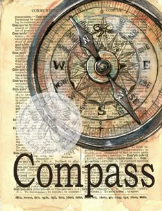 an old compass with the word compass on it